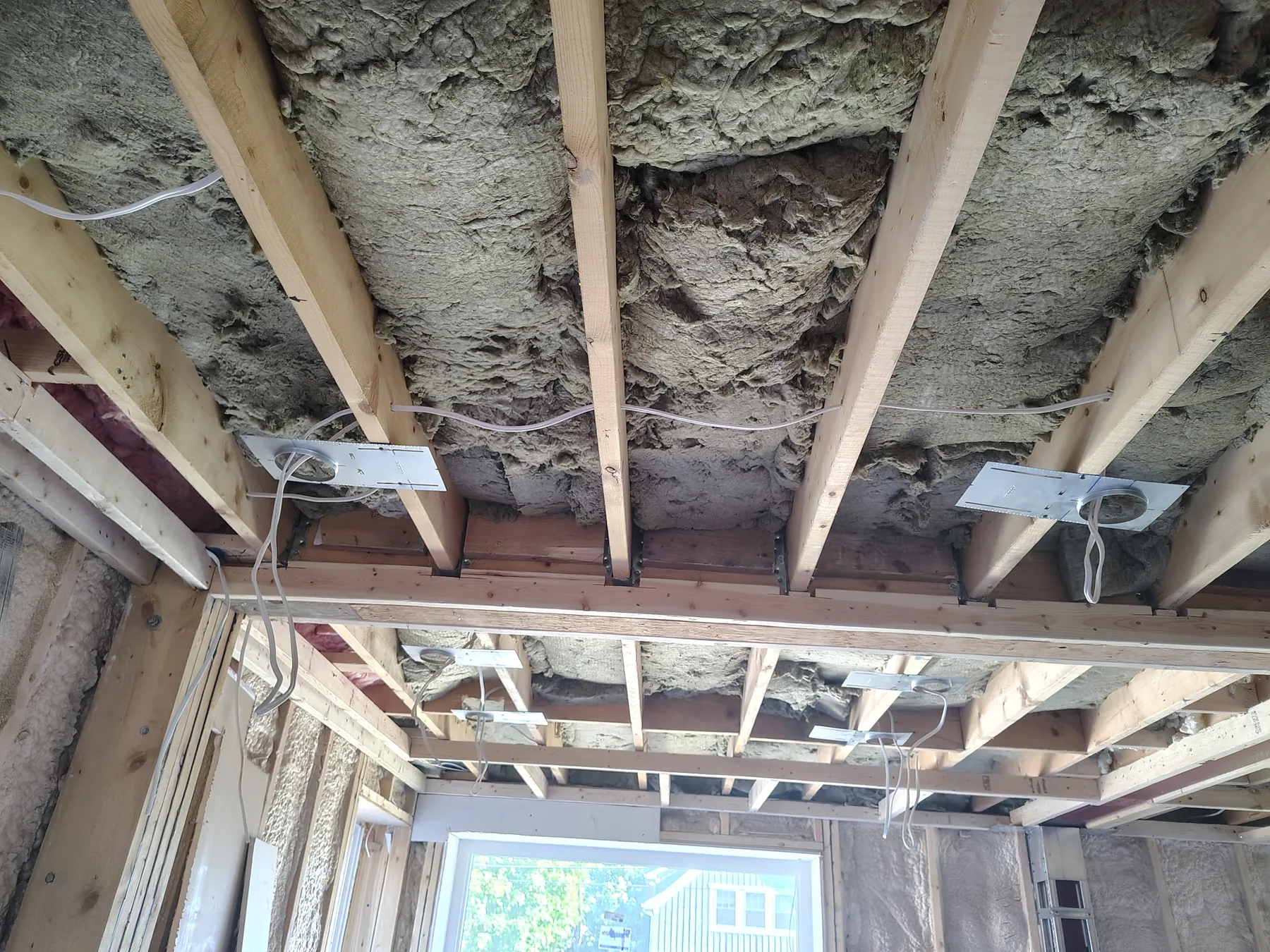 Existing basement wall prepared for new work