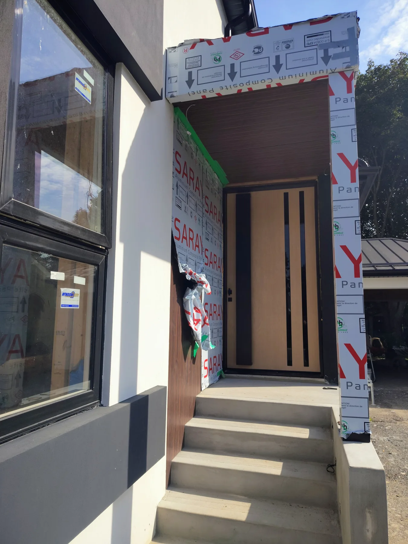Updated front entrance and exterior detailing