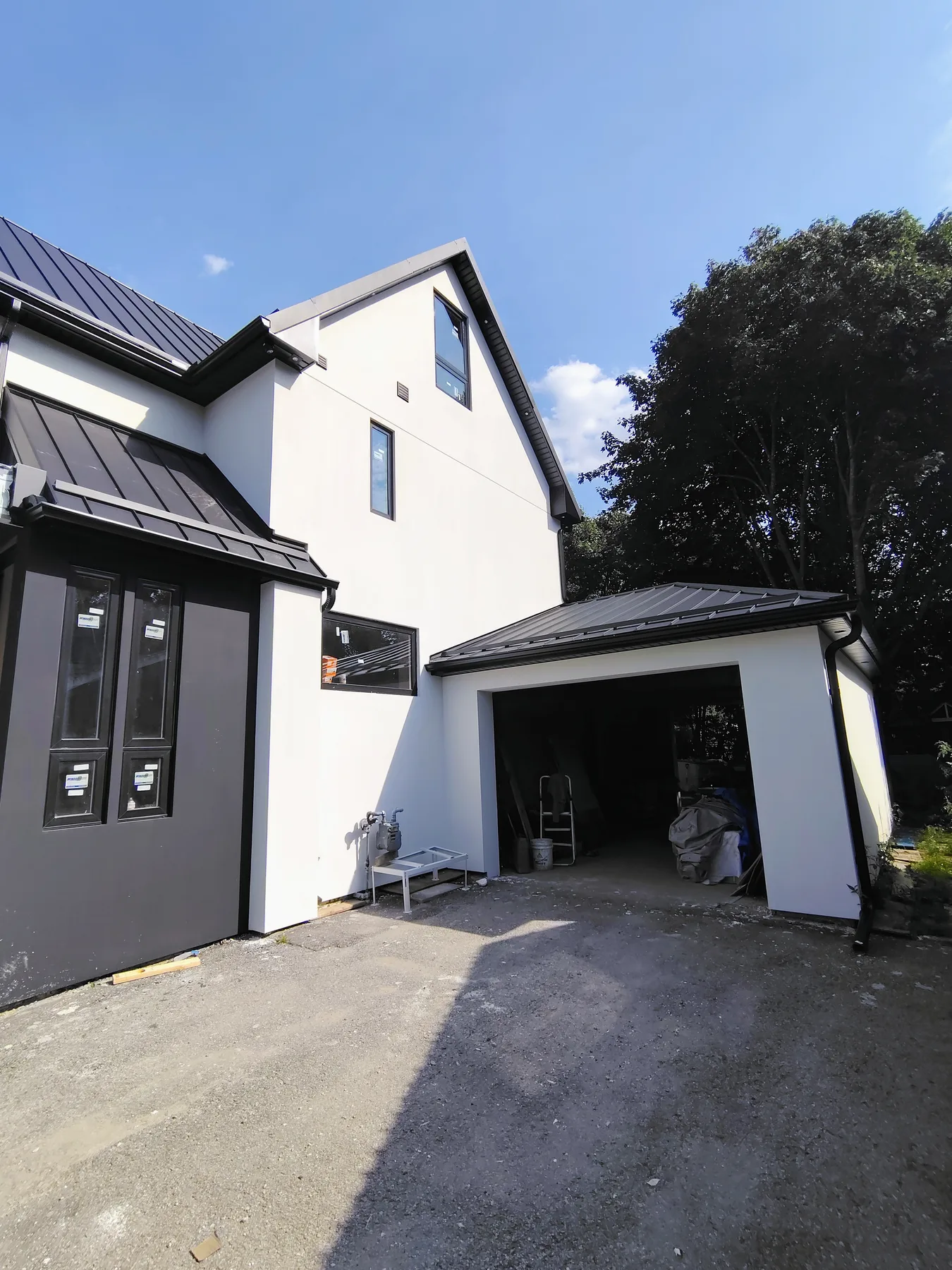 Garage and side elevation after exterior modernization