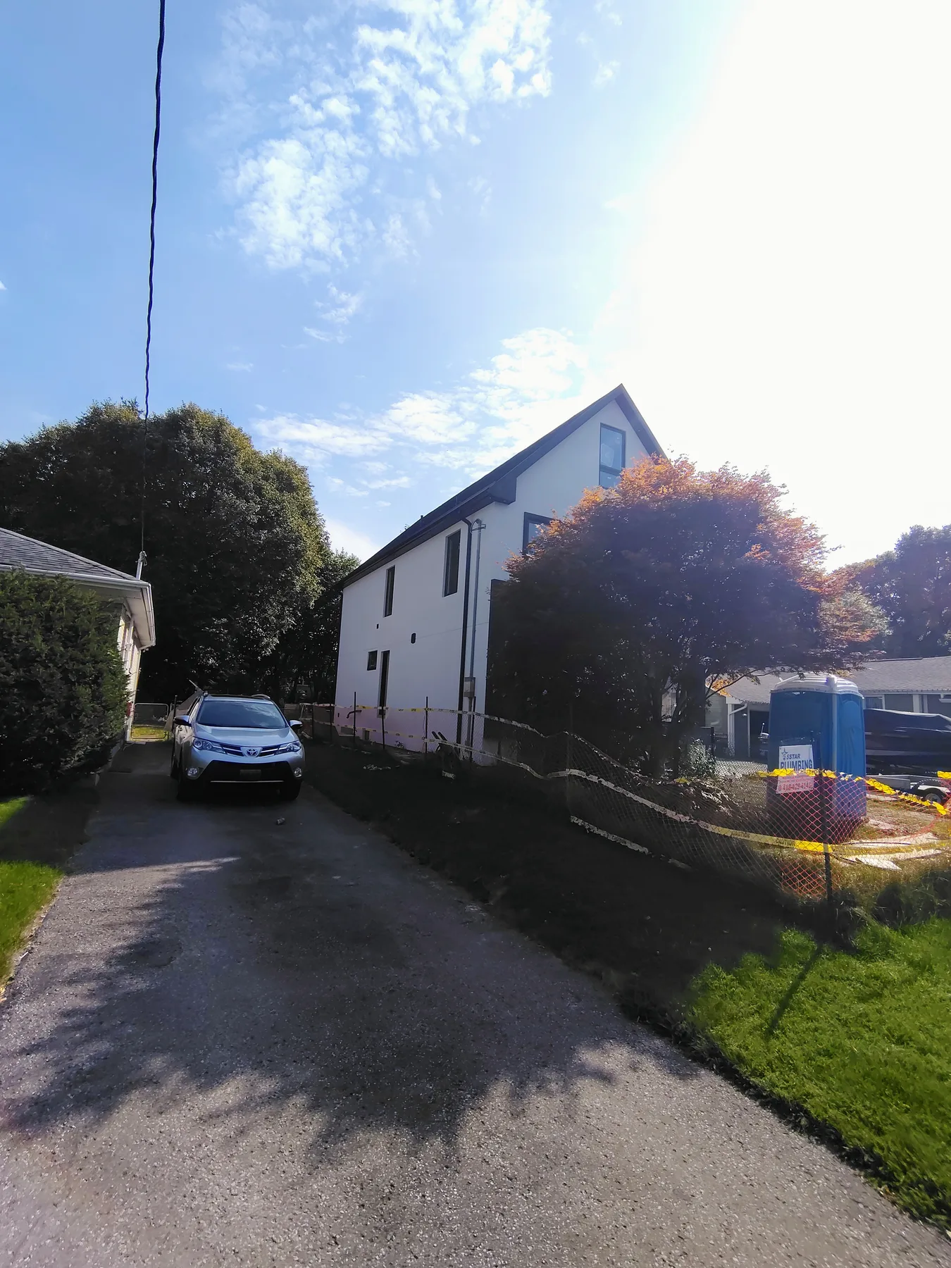 Modern siding and window composition on the side elevation