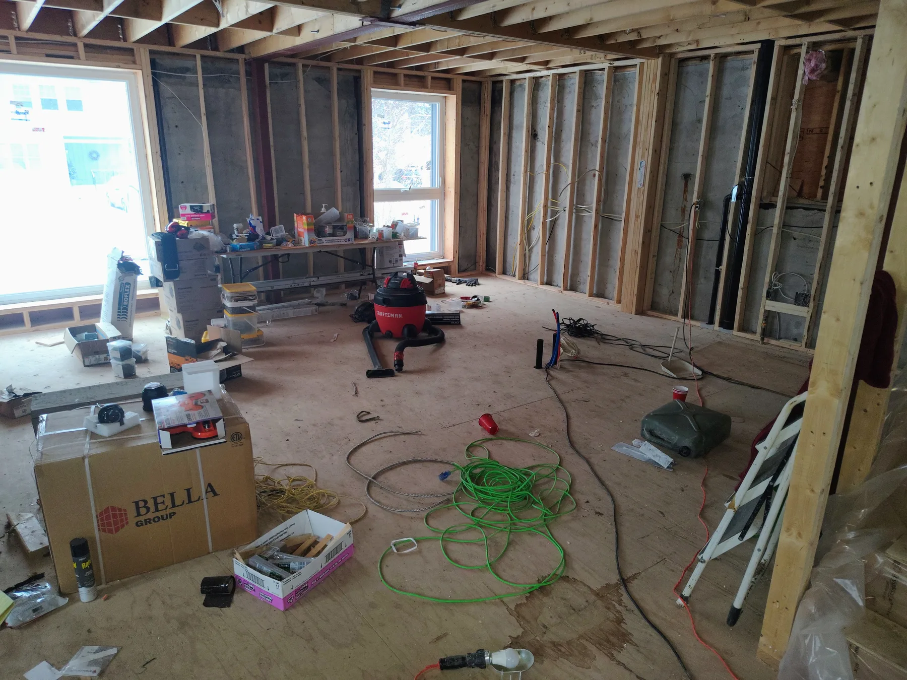 Open-concept room prepared for structural alteration