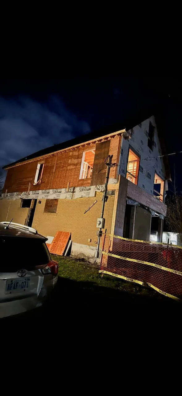 Exterior sheathing enclosing the rebuilt structure