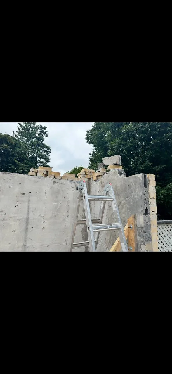 Exposed foundation walls during reconstruction